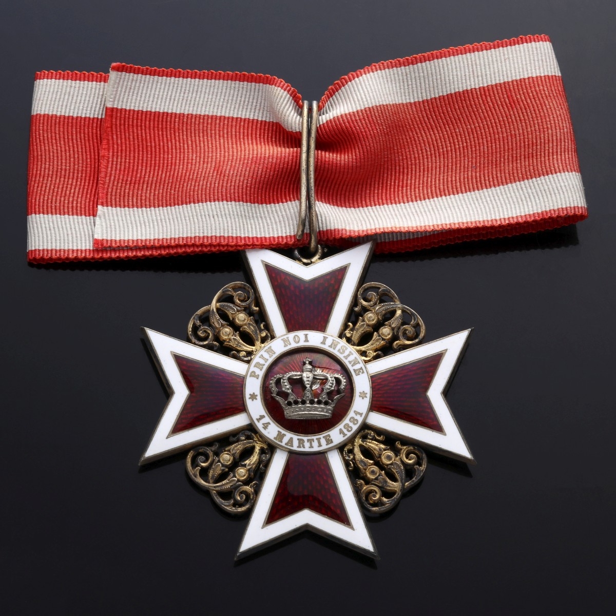 AN ORDER OF THE ROMANIAN CROWN ENAMELED BADGE