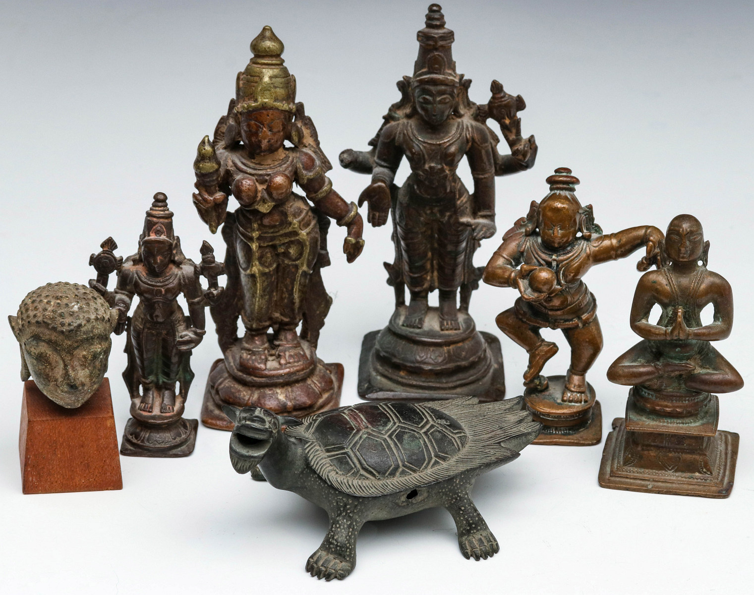 A COLLECTION OF GOOD BRONZE BUDDHIST FIGURES