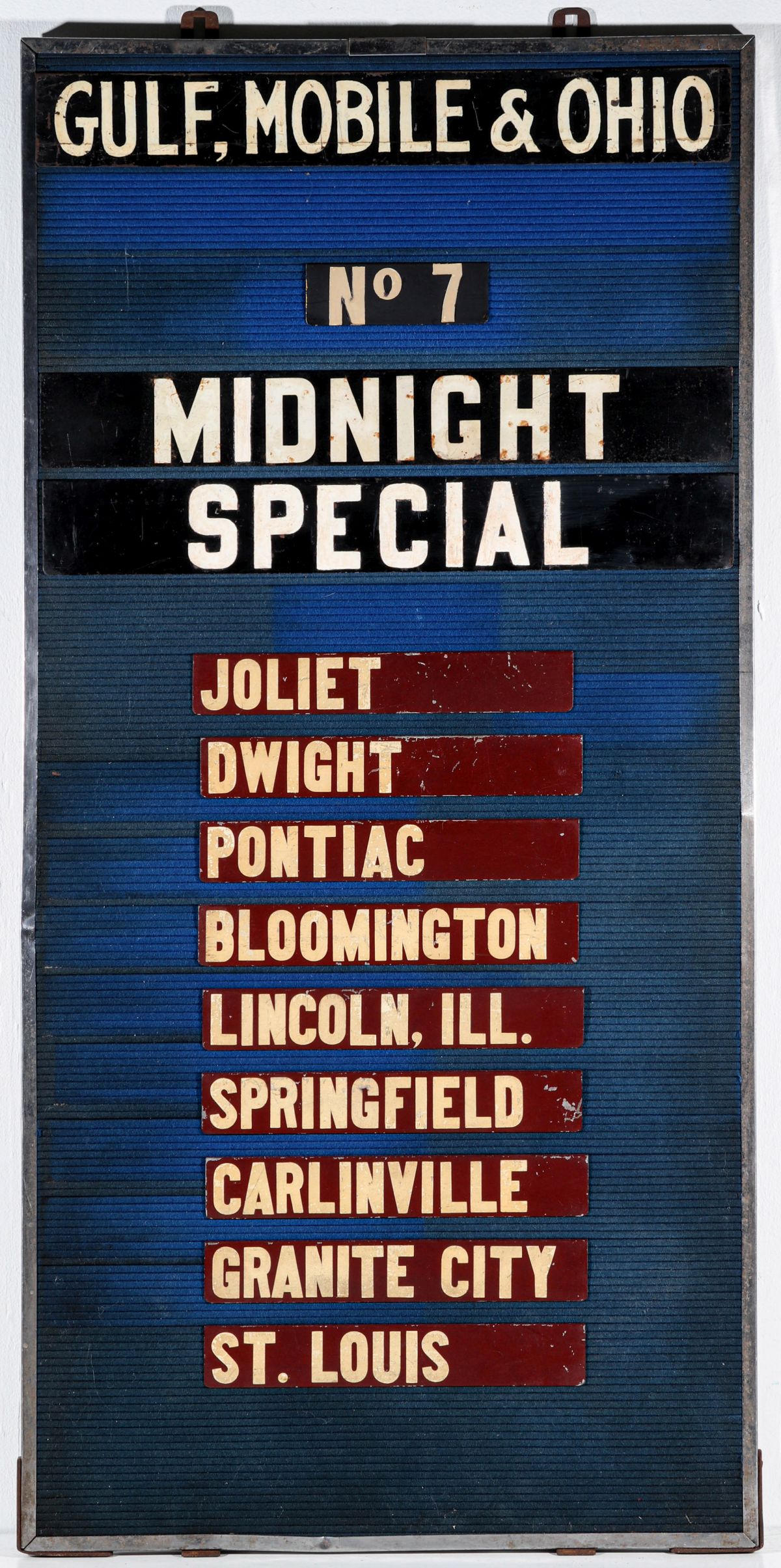 A GATE SIGN FOR GULF, MOBILE AND OHIO MIDNIGHT SPECIAL