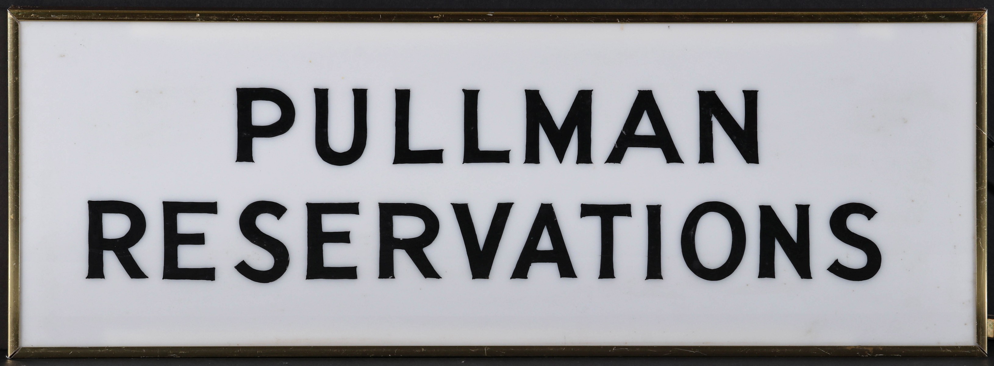 A LIGHTED ACRYLIC SIGN FOR 'PULLMAN RESERVATIONS'