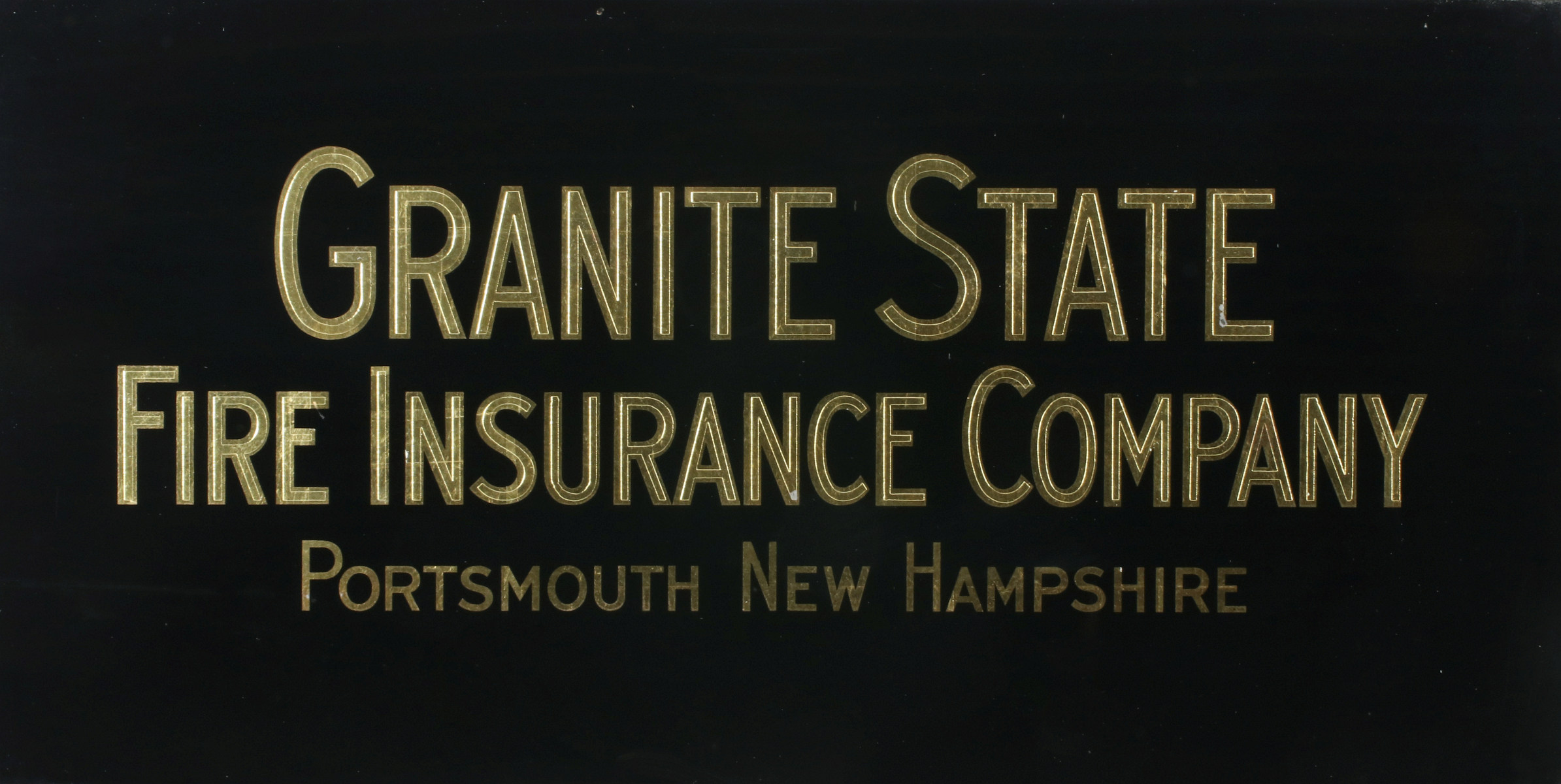 THREE REVERSE PAINTED INSURANCE SIGNS CIRCA 1930s