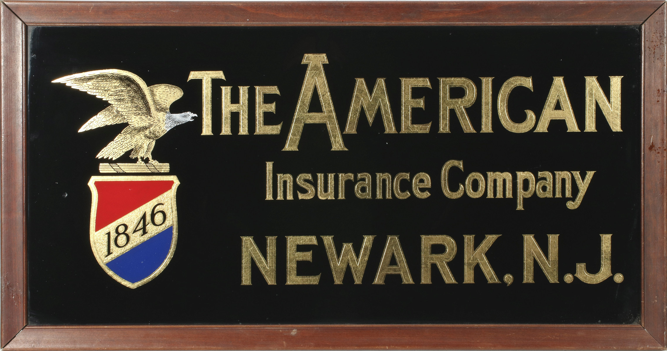 A GOOD FIVE-COLOR REVERSE PAINTED AMERICAN INS CO SIGN