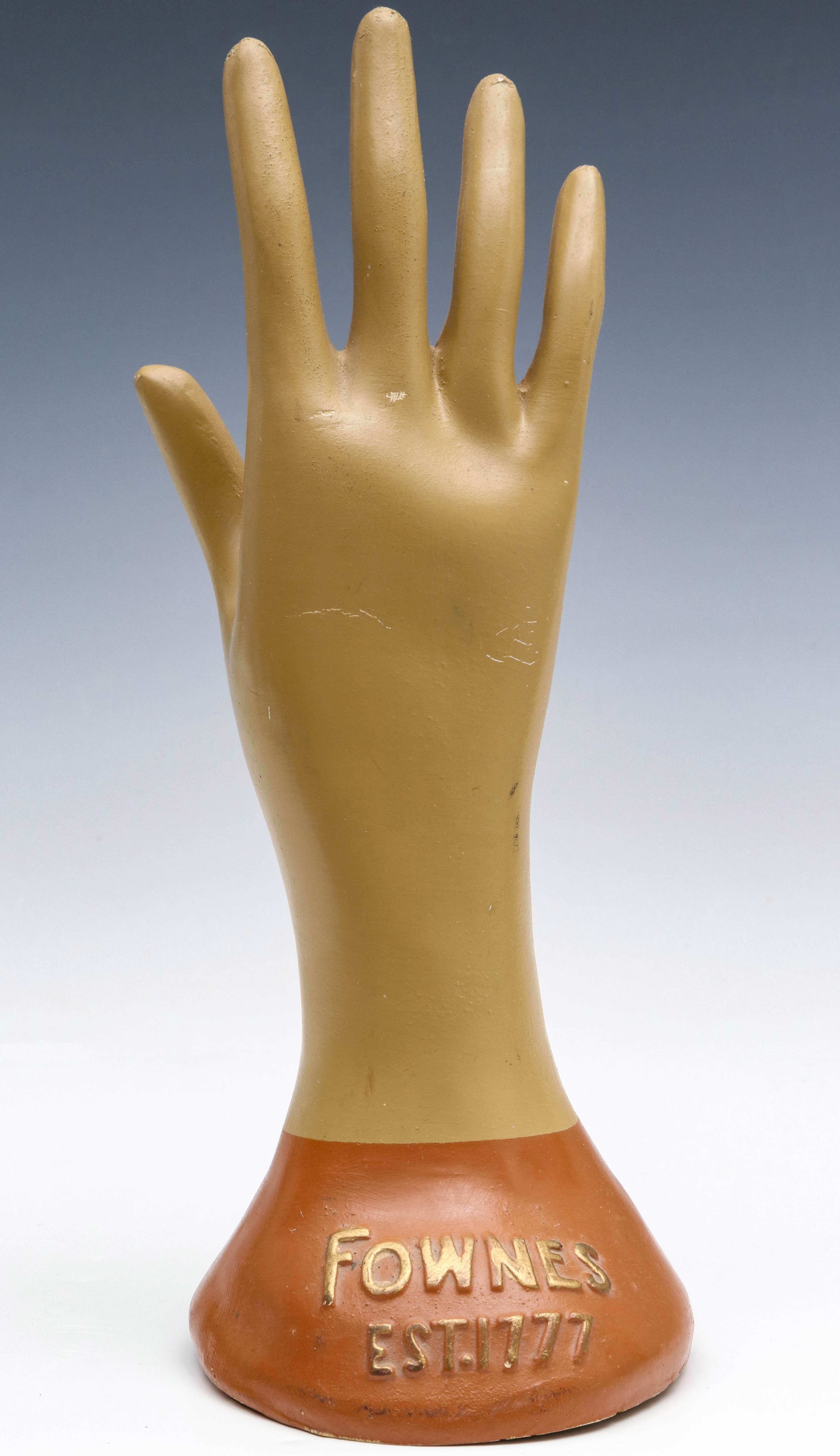A COMPOSITION HAND MANNEQUIN FOR FOWNES GLOVES
