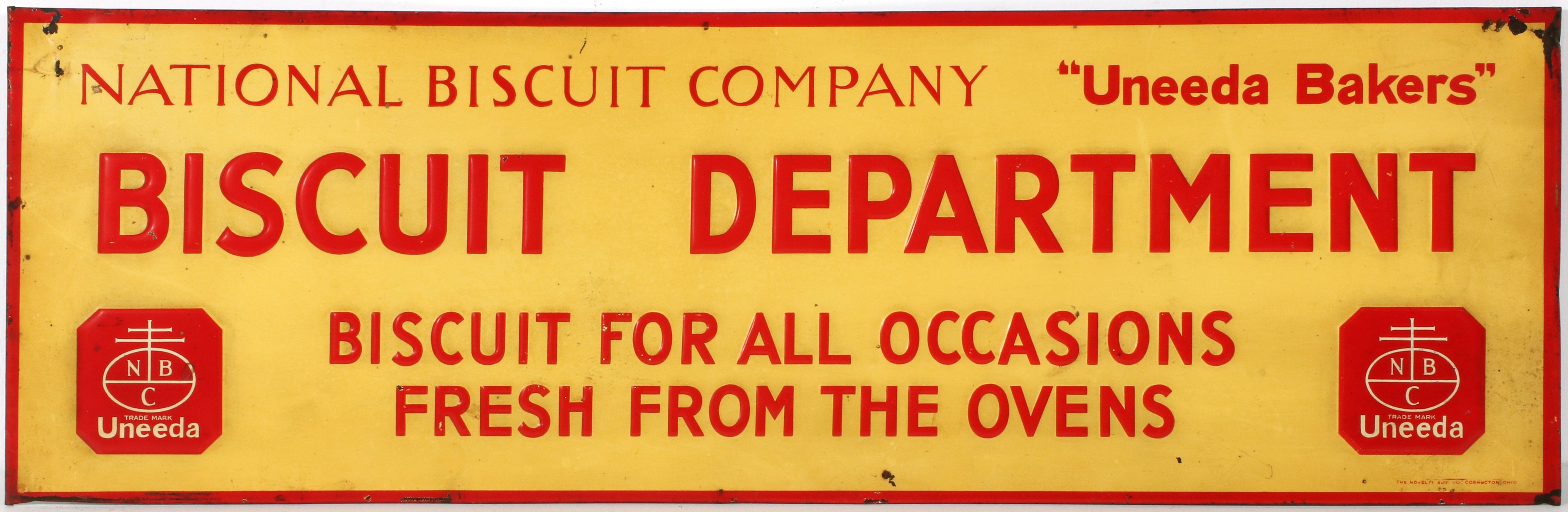 EMBOSSED TIN SIGN FOR THE NATIONAL BISCUIT DEPARTMENT