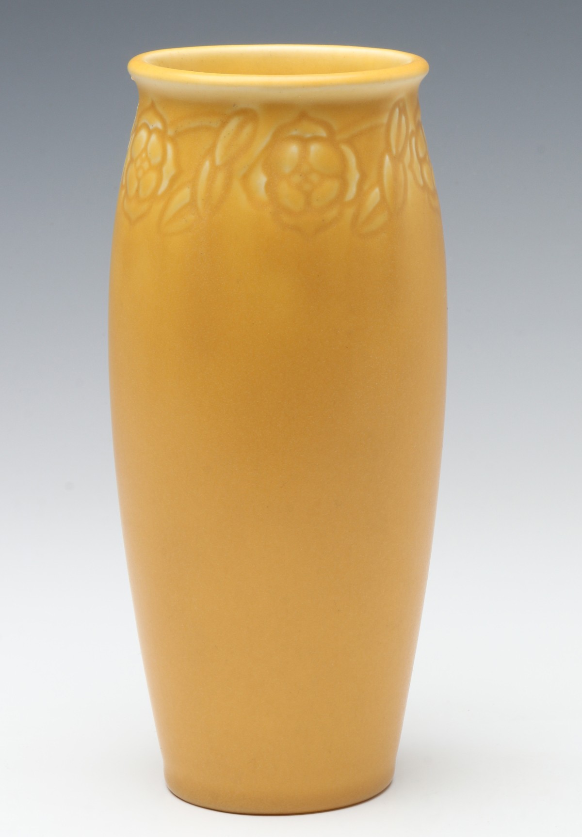 AN EIGHT INCH CARVED YELLOW MATTE ROOKWOOD VASE