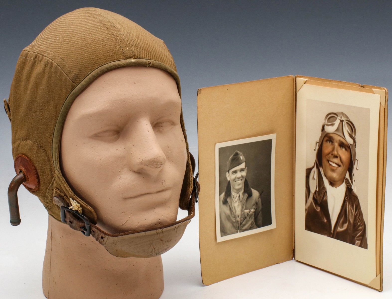 A WWII CLOTH FLIGHT HELMET WITH INSCRIBED SP