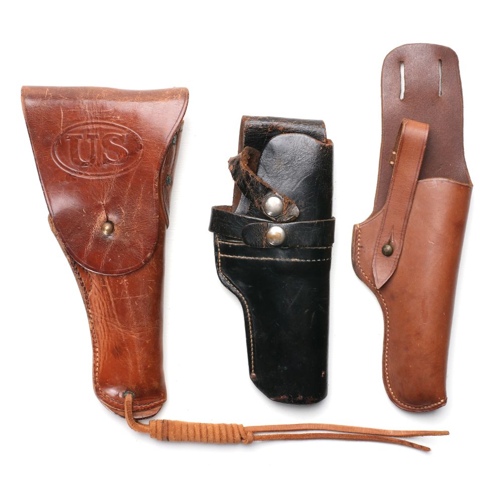THREE US MILITARY LEATHER .45 HOLSTERS