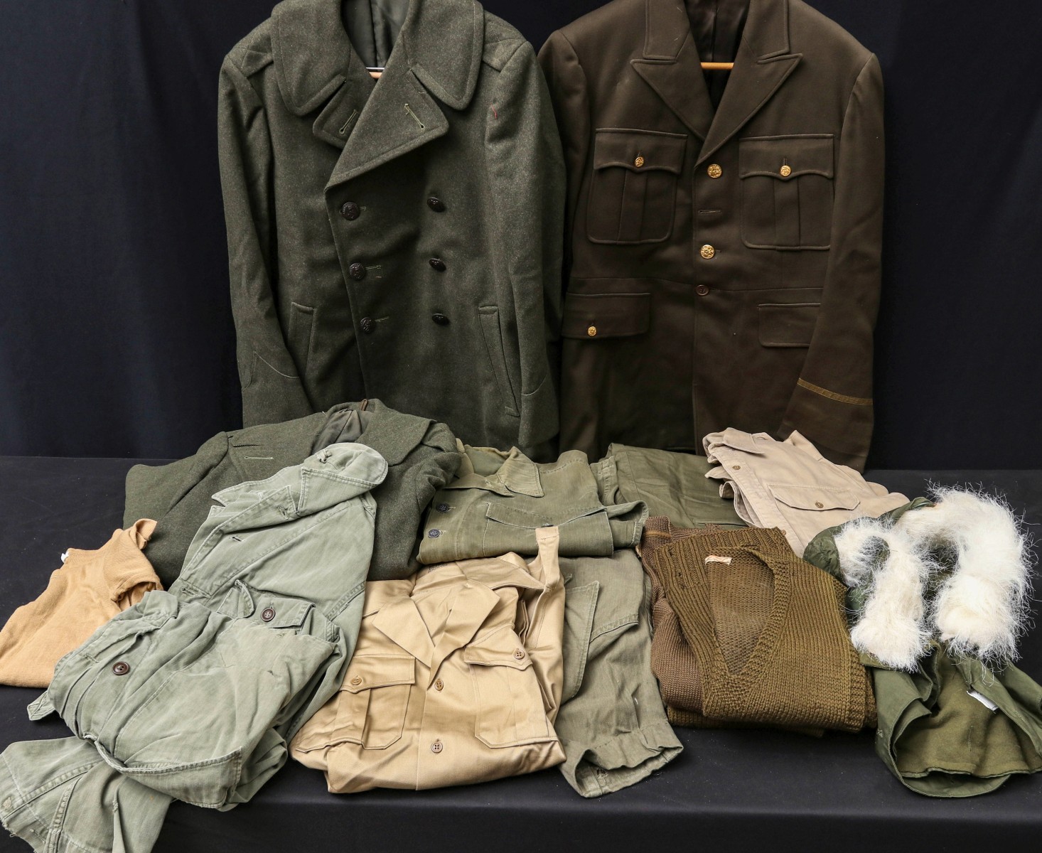 ASSORTED WWII CLOTHING AND OVERCOATS