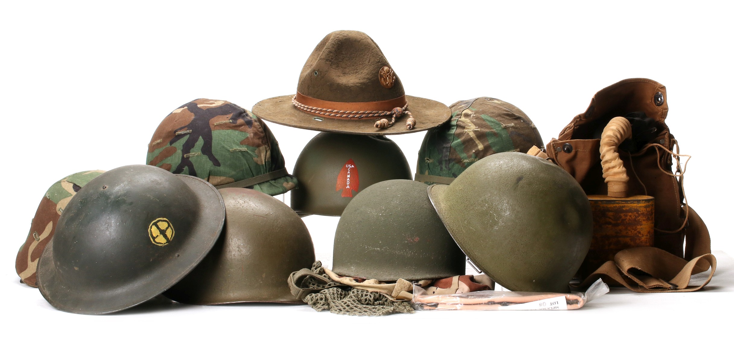 A COLLECTION OF HEADGEAR ALONG WITH OTHER MILITARIA