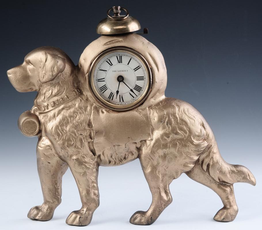 A CAST IRON DOG WITH WESTCLOX 'THE LOOKOUT' MOVEMENT