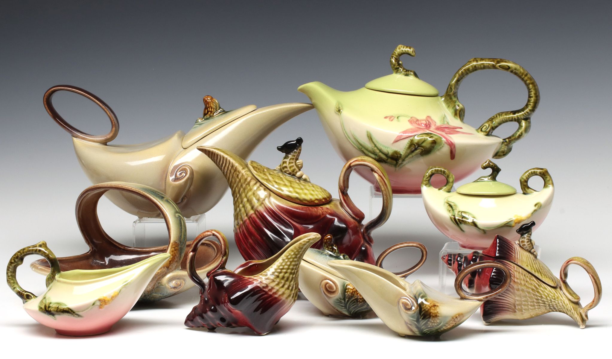 A COLLECTION OF HULL ART POTTERY TEA SETS AND MORE