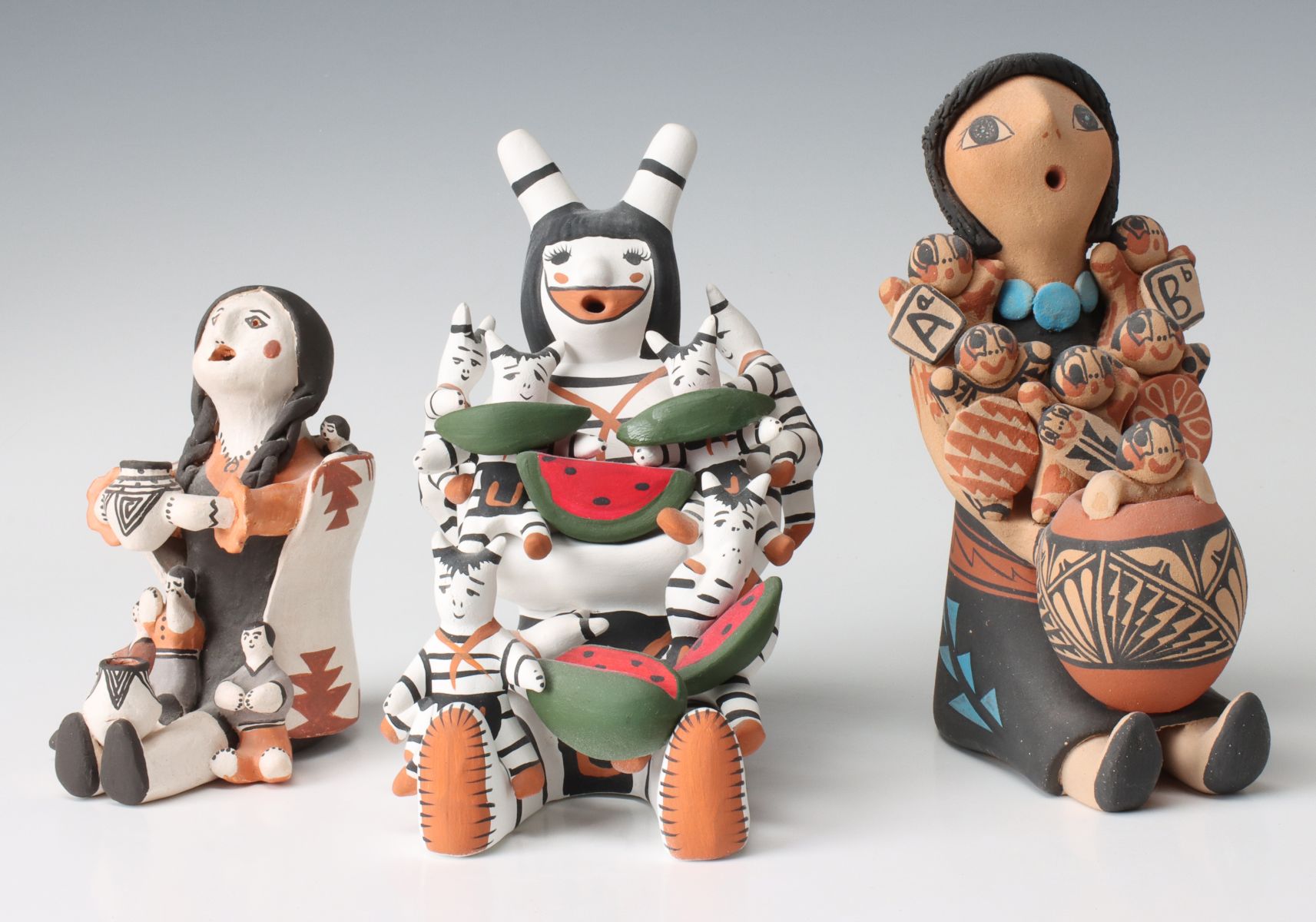 A COLLECTION OF PUEBLO POTTERY STORYTELLERS