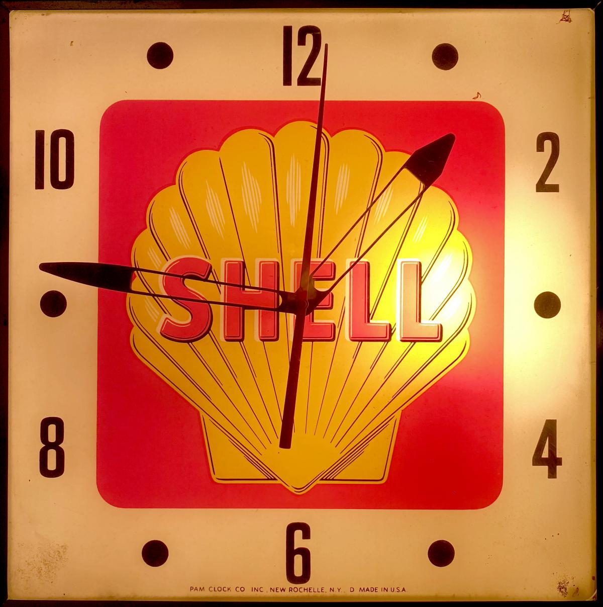 A SHELL GASOLINE LIGHTED ADVERTISING CLOCK