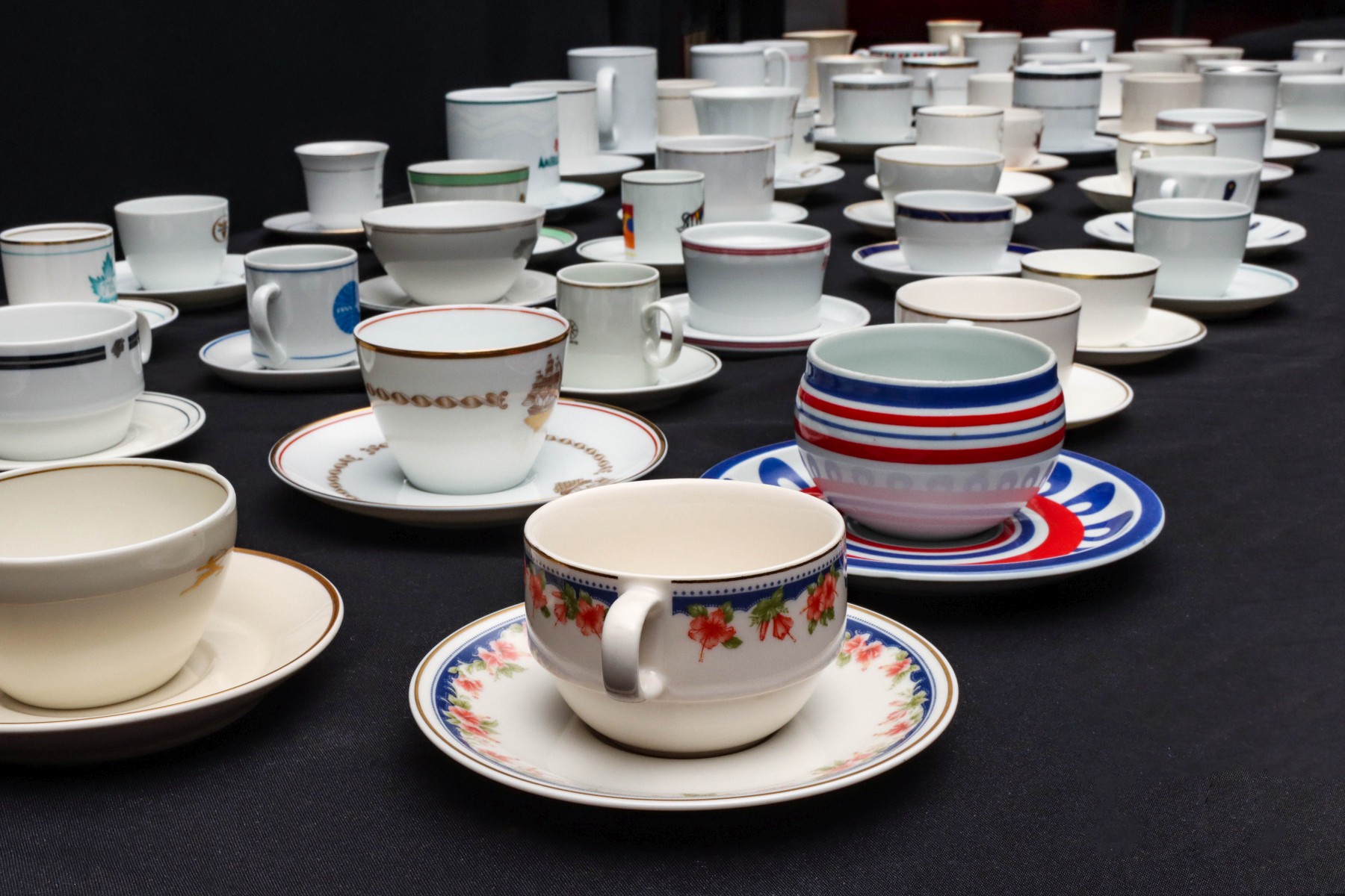 A COLLECTION OF 114 AIRLINE DINING CHINA CUP/SAUCER SETS