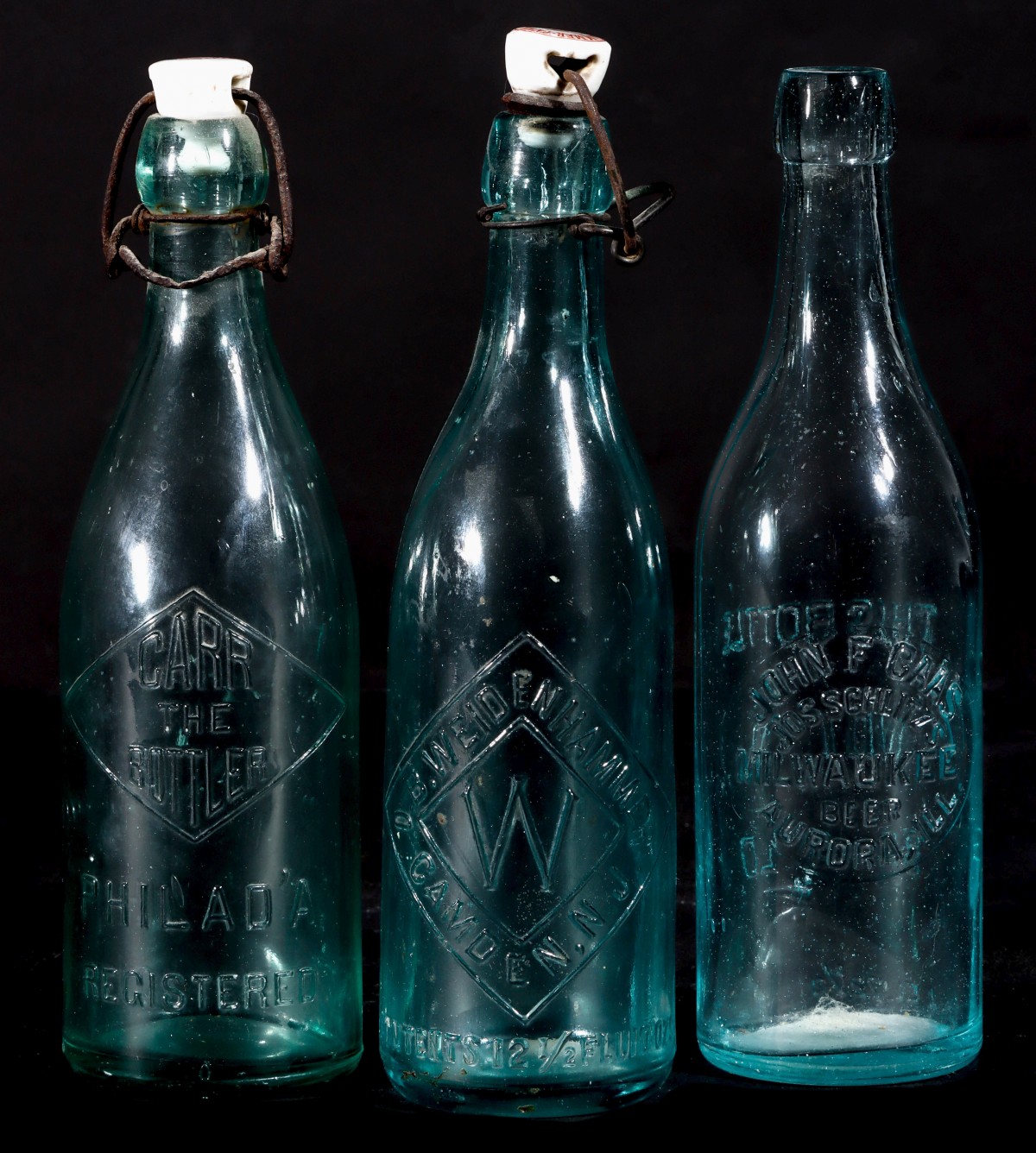 LATE 19TH C. BEER BOTTLES WITH ADVTG PORCELAIN STOPPERS