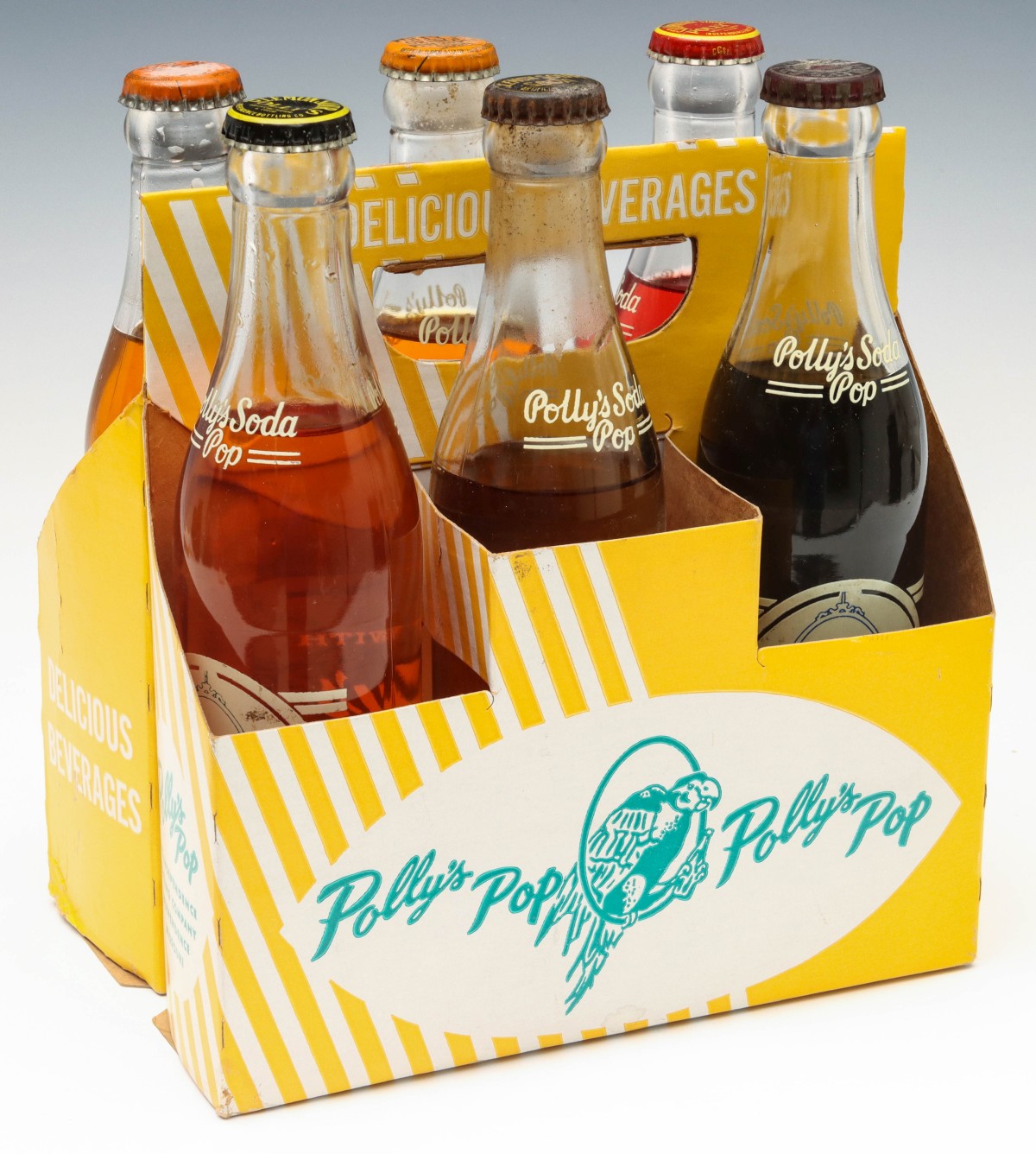 A SIX BOTTLE CARRIER WITH ORIGINAL UNOPENED POLLY'S POP
