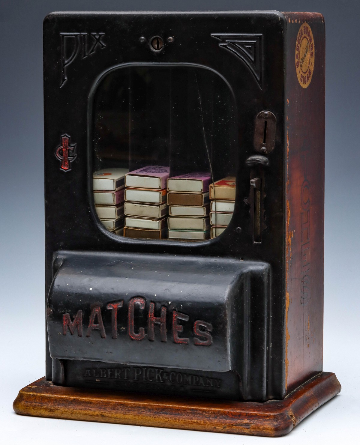 A ONE CENT BOXED MATCHES VENDING MACHINE CIRCA 1920s