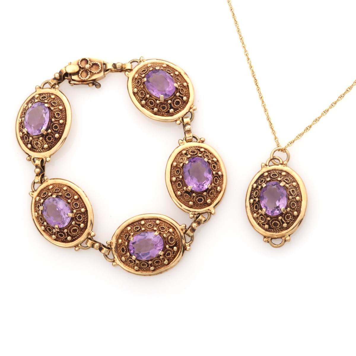 A 14K GOLD AND AMETHYST BRACELET AND PENDANT SET