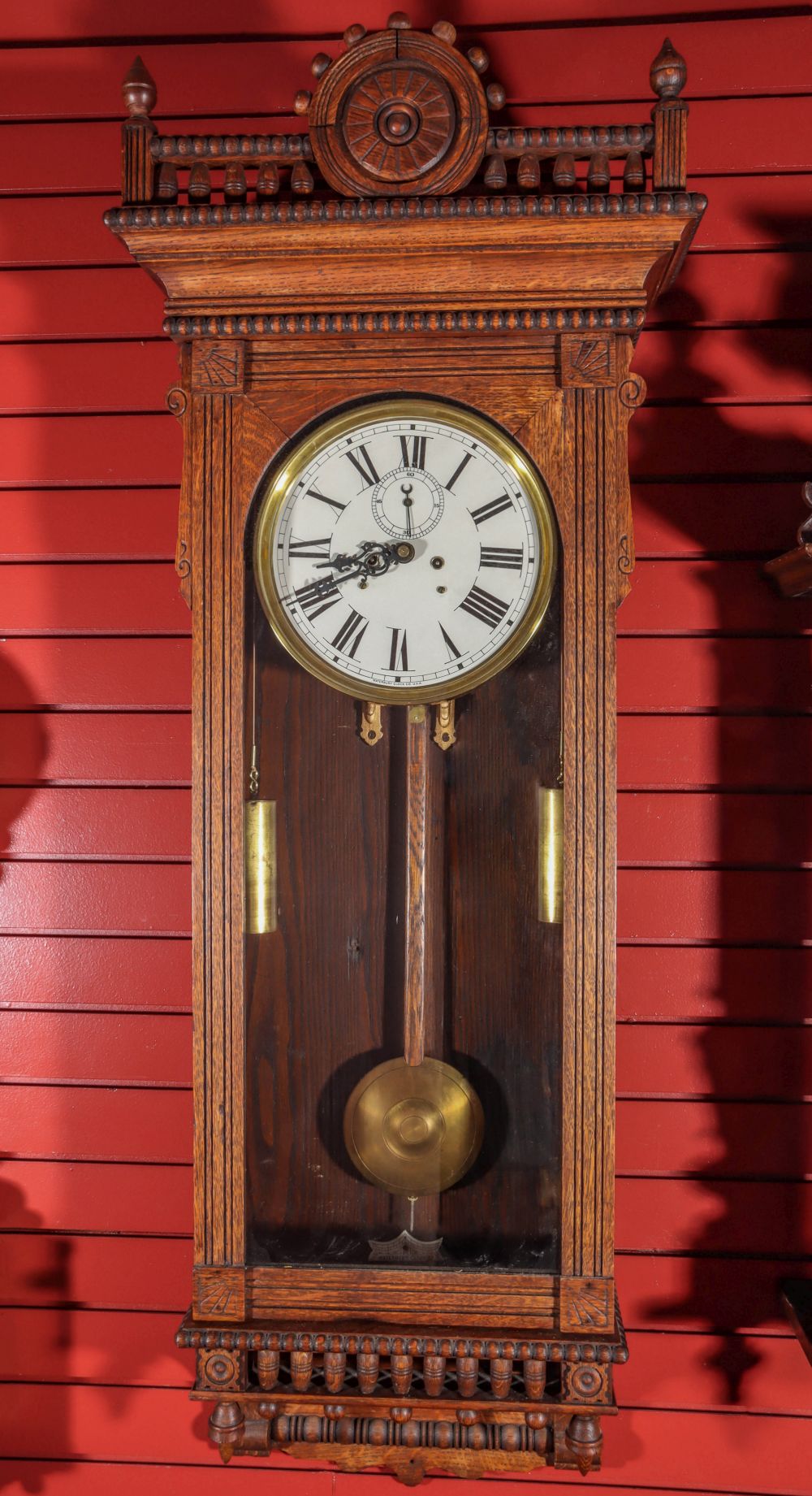 A GOOD OAK CASE WATERBURY REGULATOR NUMBER 53