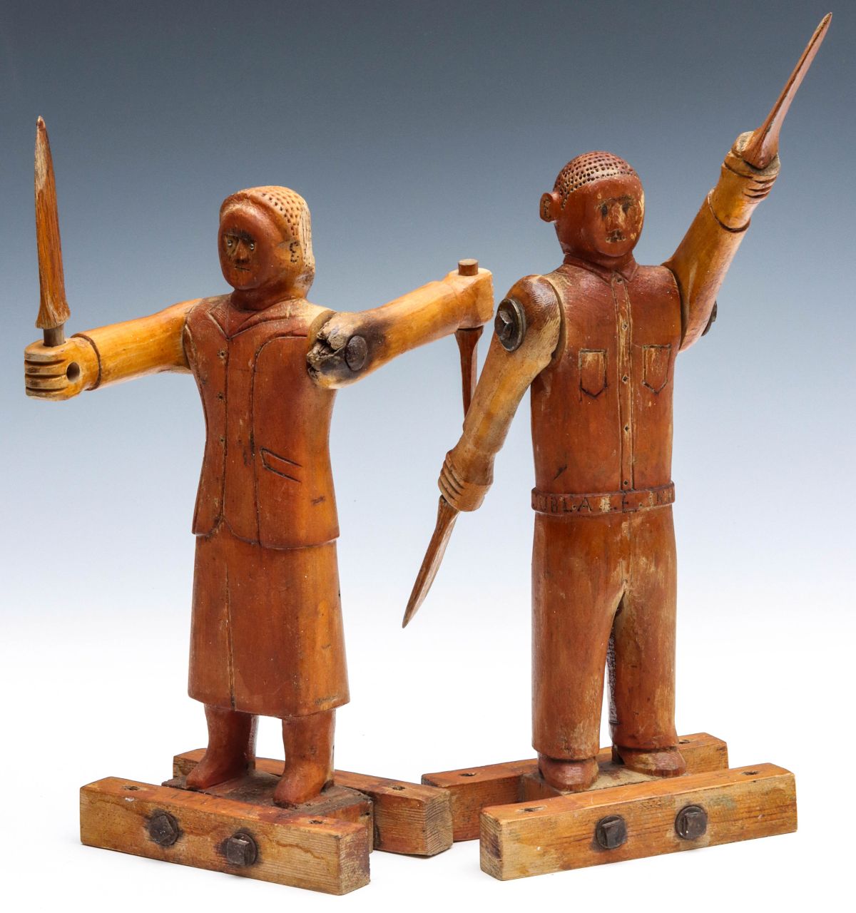 EARLY 20TH C. MALE AND FEMALE FIGURAL WHIRLIGIG PAIR
