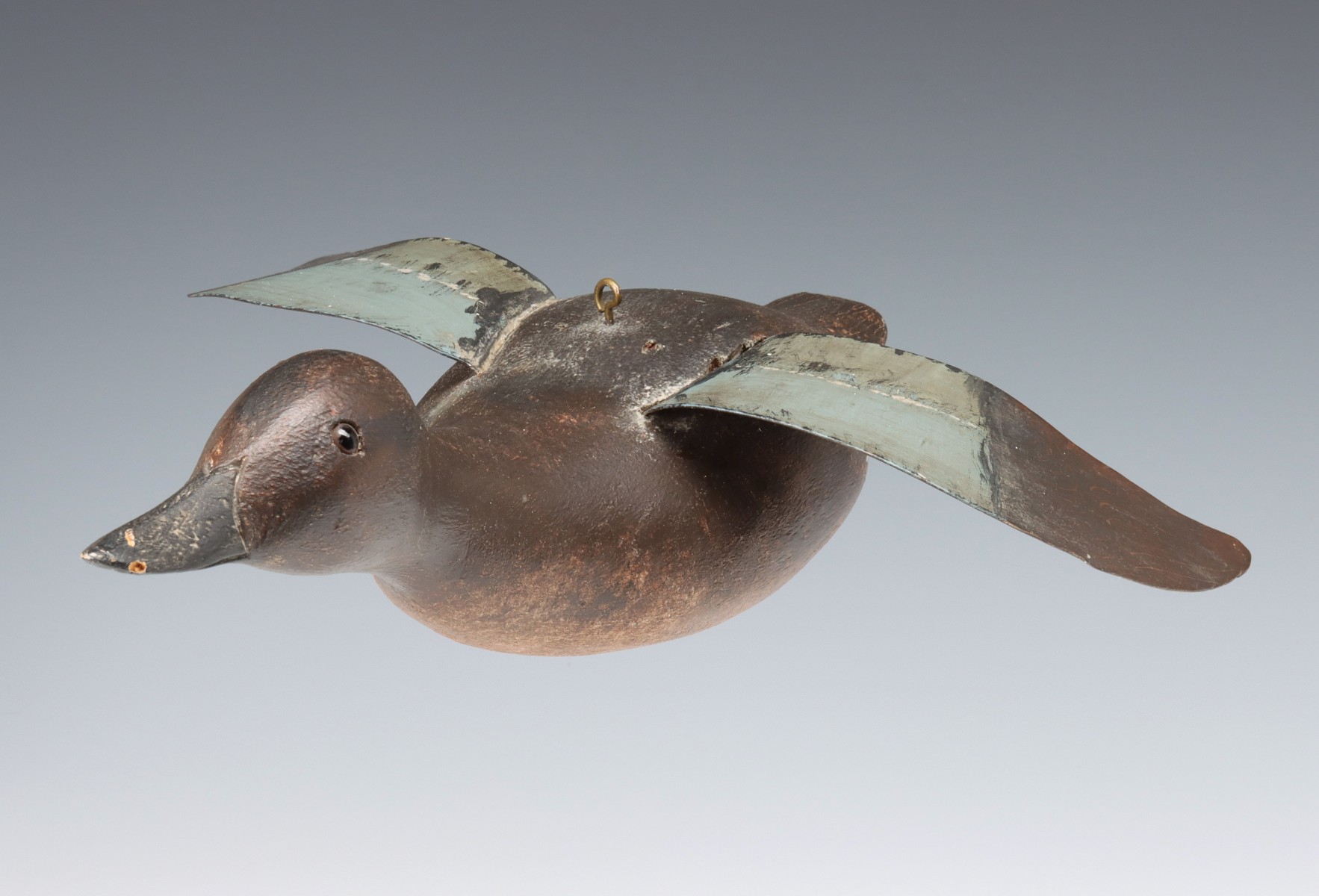 A GOOD EARLY 20TH C. BLUE WING TEAL IN FLIGHT DECOY