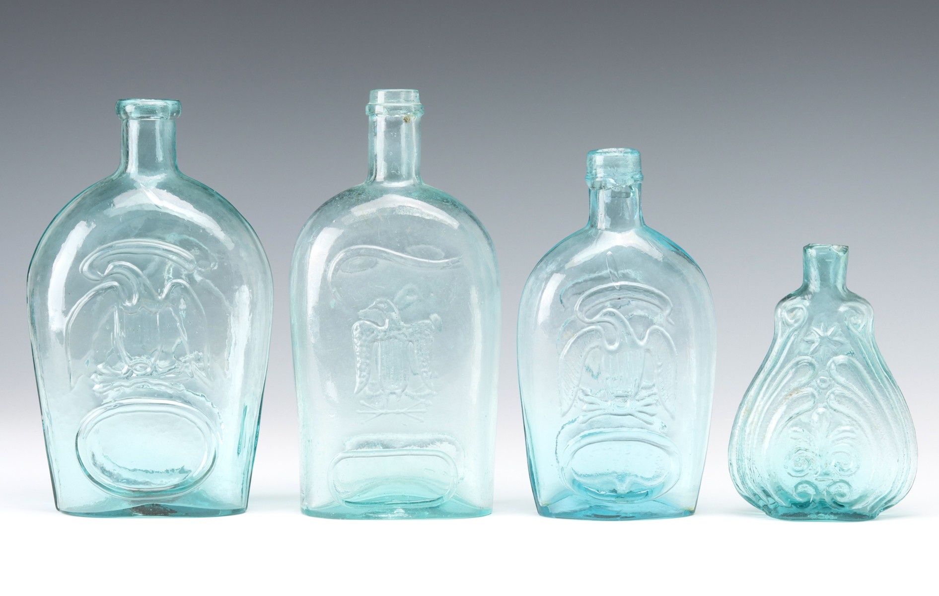 FOUR 19TH CENTURY AMERICAN HISTORICAL FLASKS