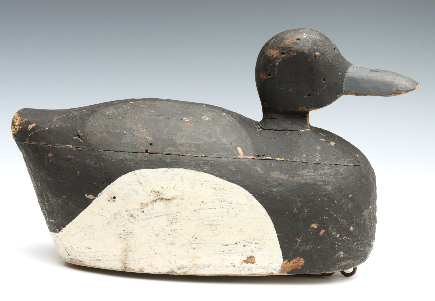 A PRIMITIVE DECOY PAIRED WITH A REPAINTED MASON DECOY