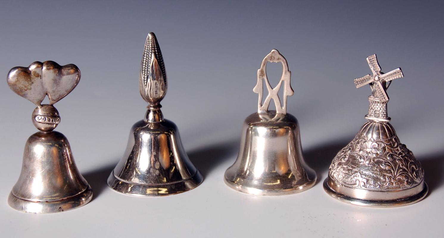 FOUR SMALL STERLING BELLS