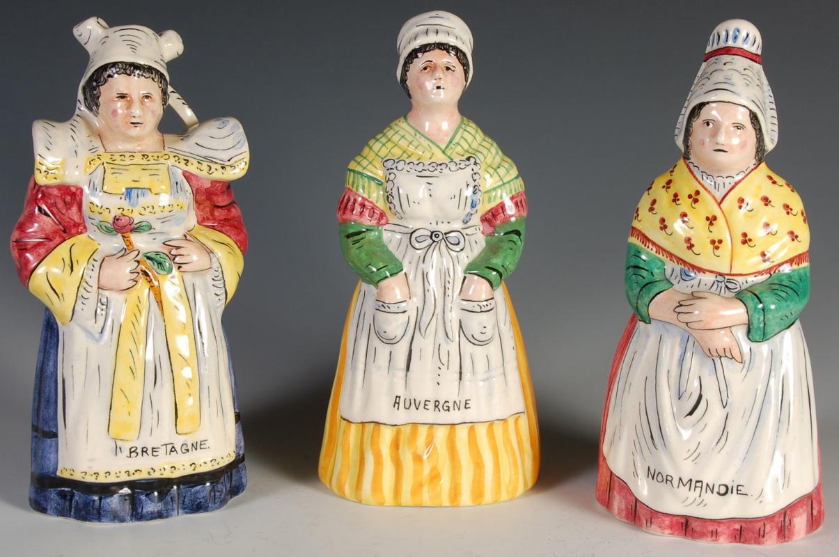 THREE FRENCH FAIENCE FIGURAL LADY BELLS