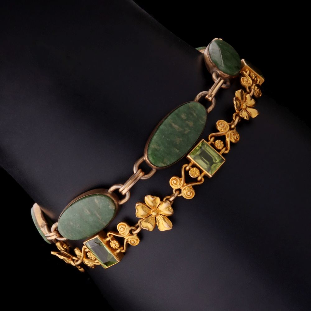 TWO EARLY 20TH CENTURY GOLD FILLED LINK BRACELETS