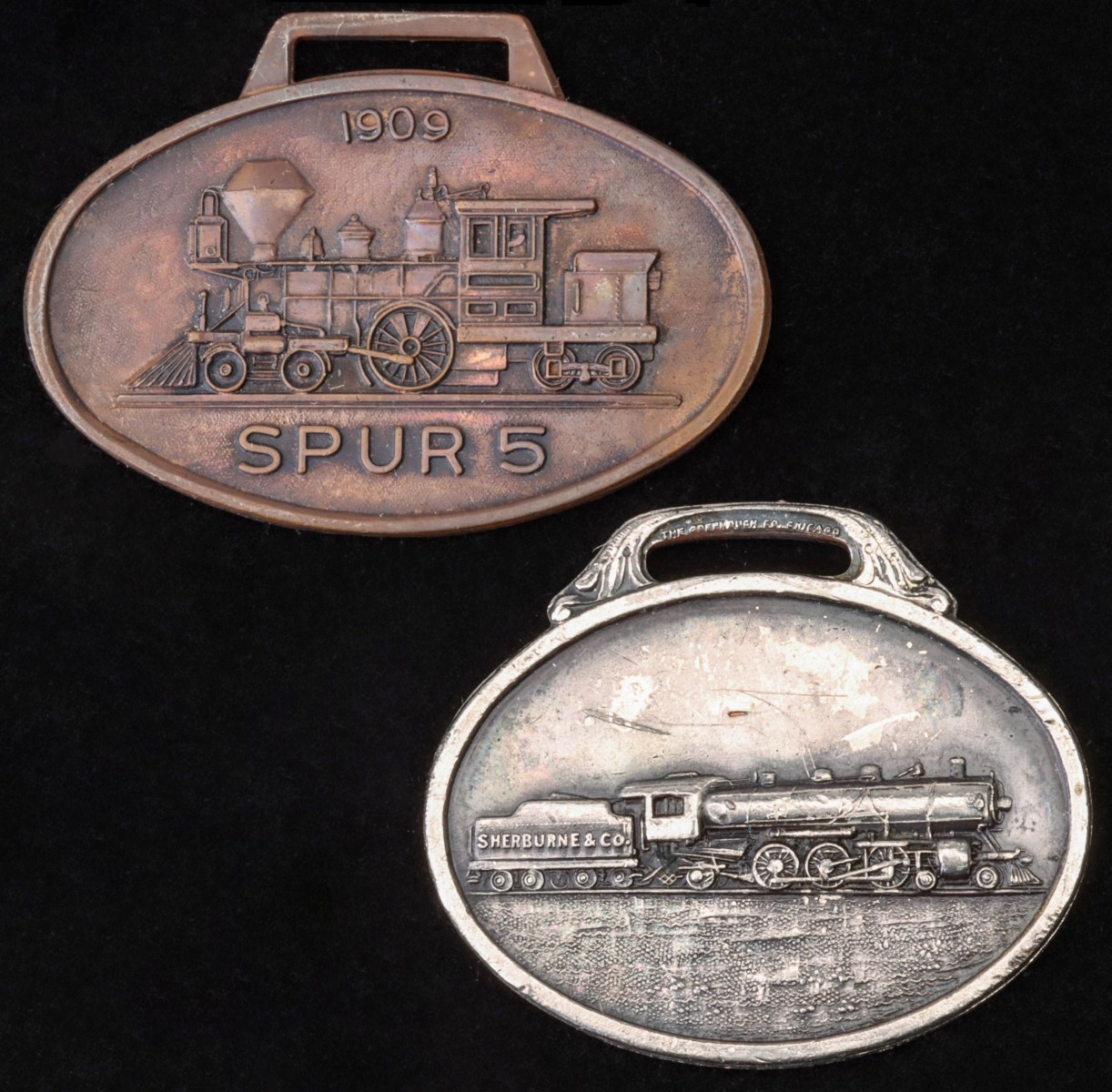 TWO EARLY 20TH C RAILROAD SUPPLY ADVERTISING WATCH FOBS