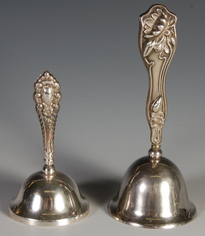 TWO ANTIQUE BELLS WITH STERLING SILVER HANDLES 