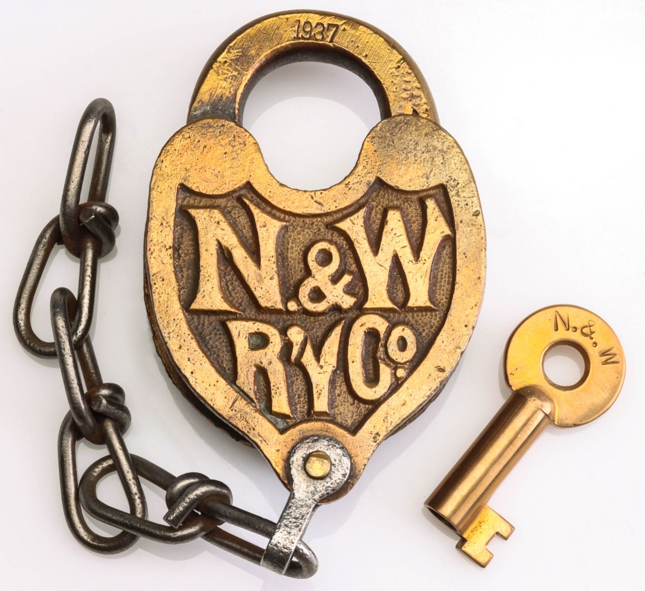 A NORFOLK AND WESTERN CAST BACK PADLOCK WITH KEY