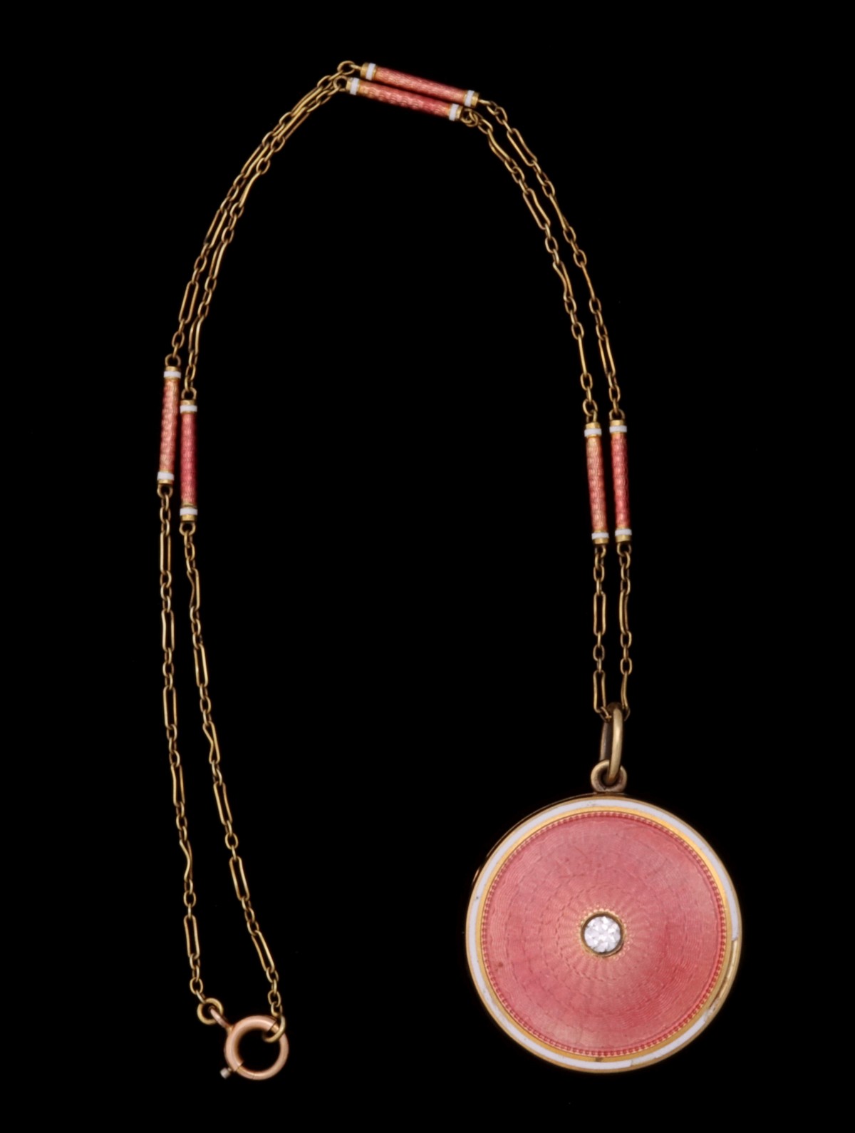 A 14K GOLD GUILLOCHE LOCKET WITH DIAMOND, AS IS