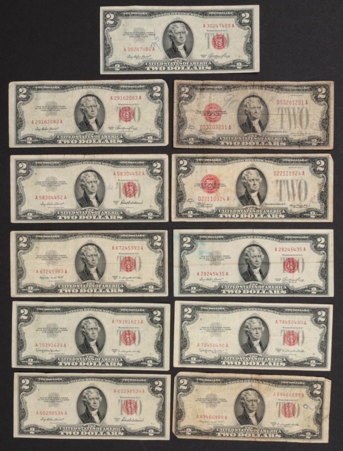 ELEVEN RED SEAL 1920s TWO DOLLAR BILLS