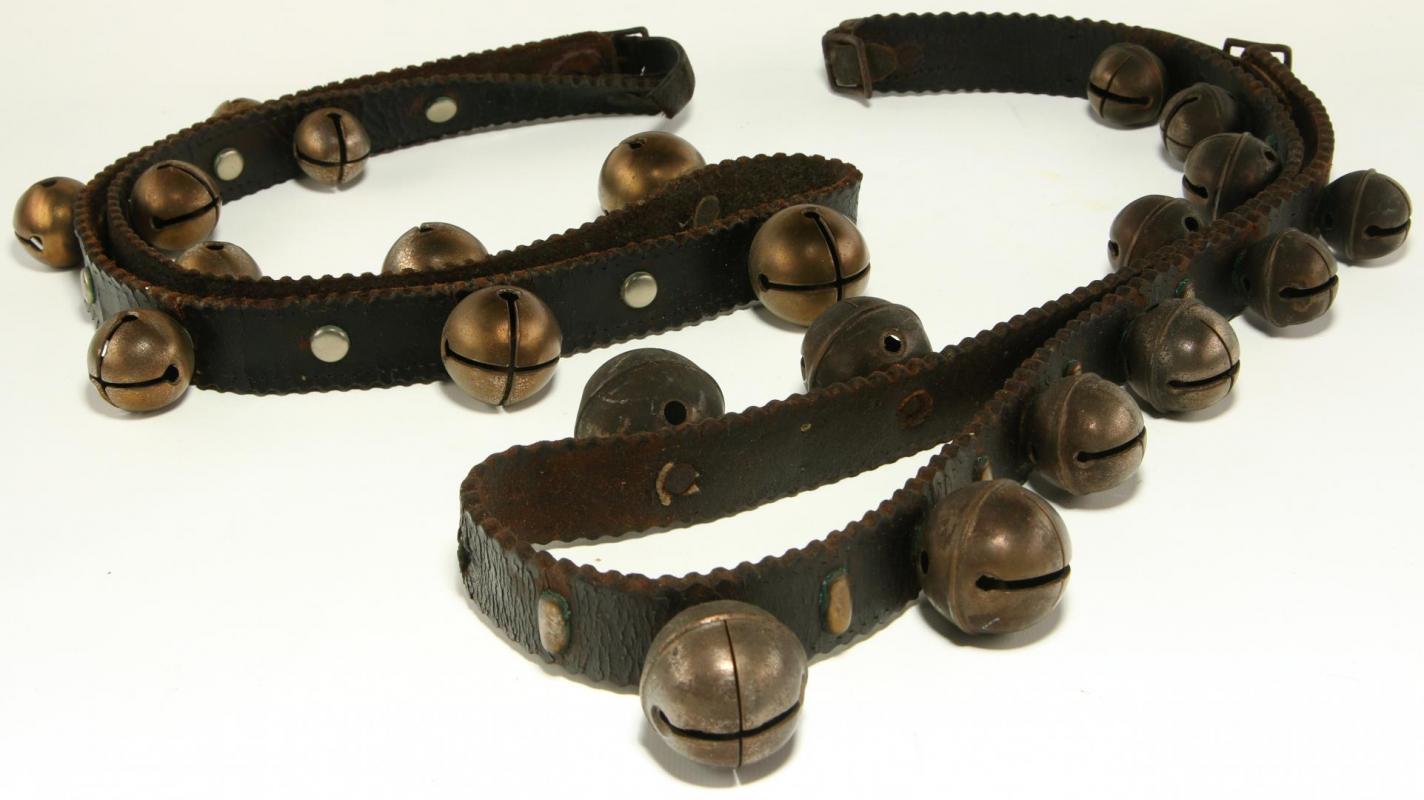 TWO STRANDS OF ANTIQUE SLEIGH BELLS