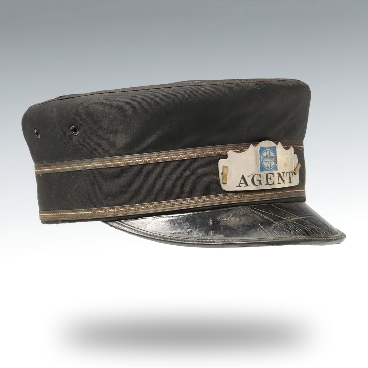 AN EARLY 20TH C. SANTA FE 'AGENT' VISOR CAP