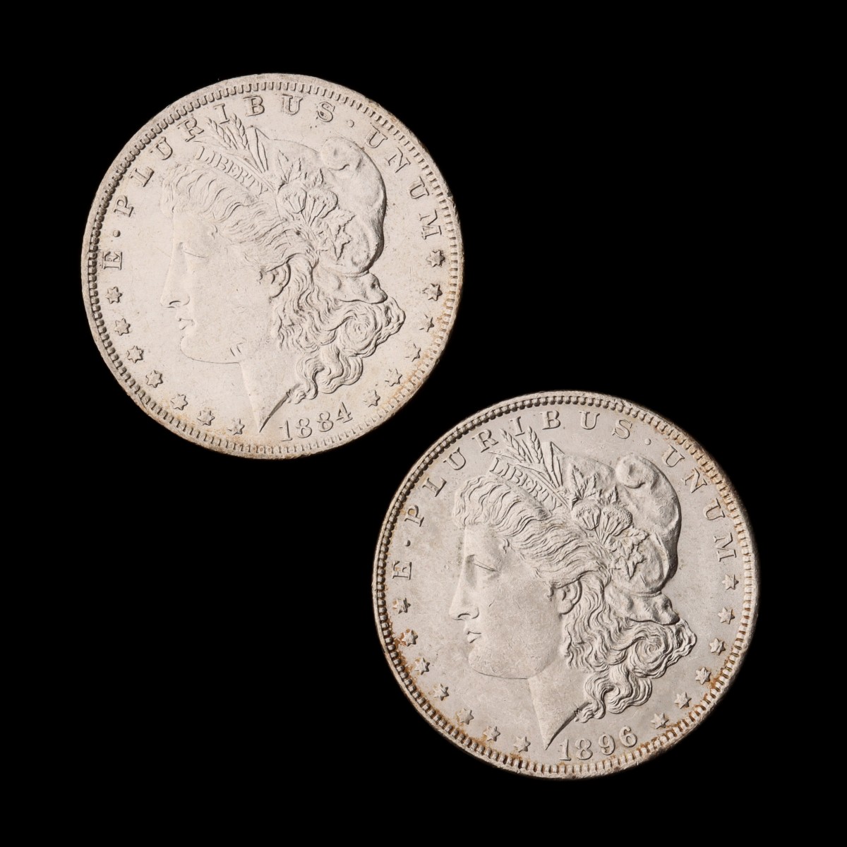 TWO HIGHER GRADE MORGAN SILVER DOLLARS, 1884-O AND 1896