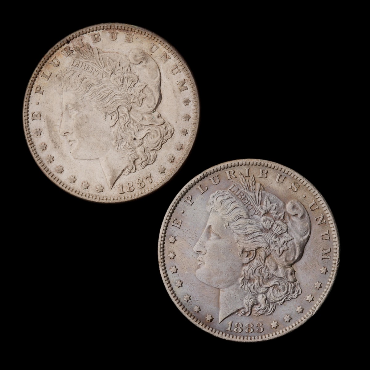 TWO HIGHER GRADE MORGAN SILVER DOLLARS, 1883-O AND 1887