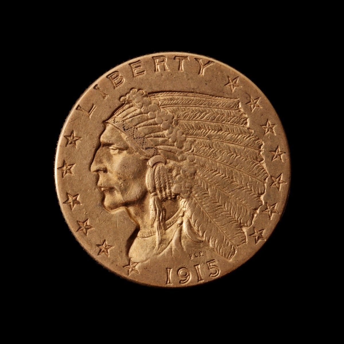 A 1915 U.S. 2-1/2 DOLLAR GOLD COIN