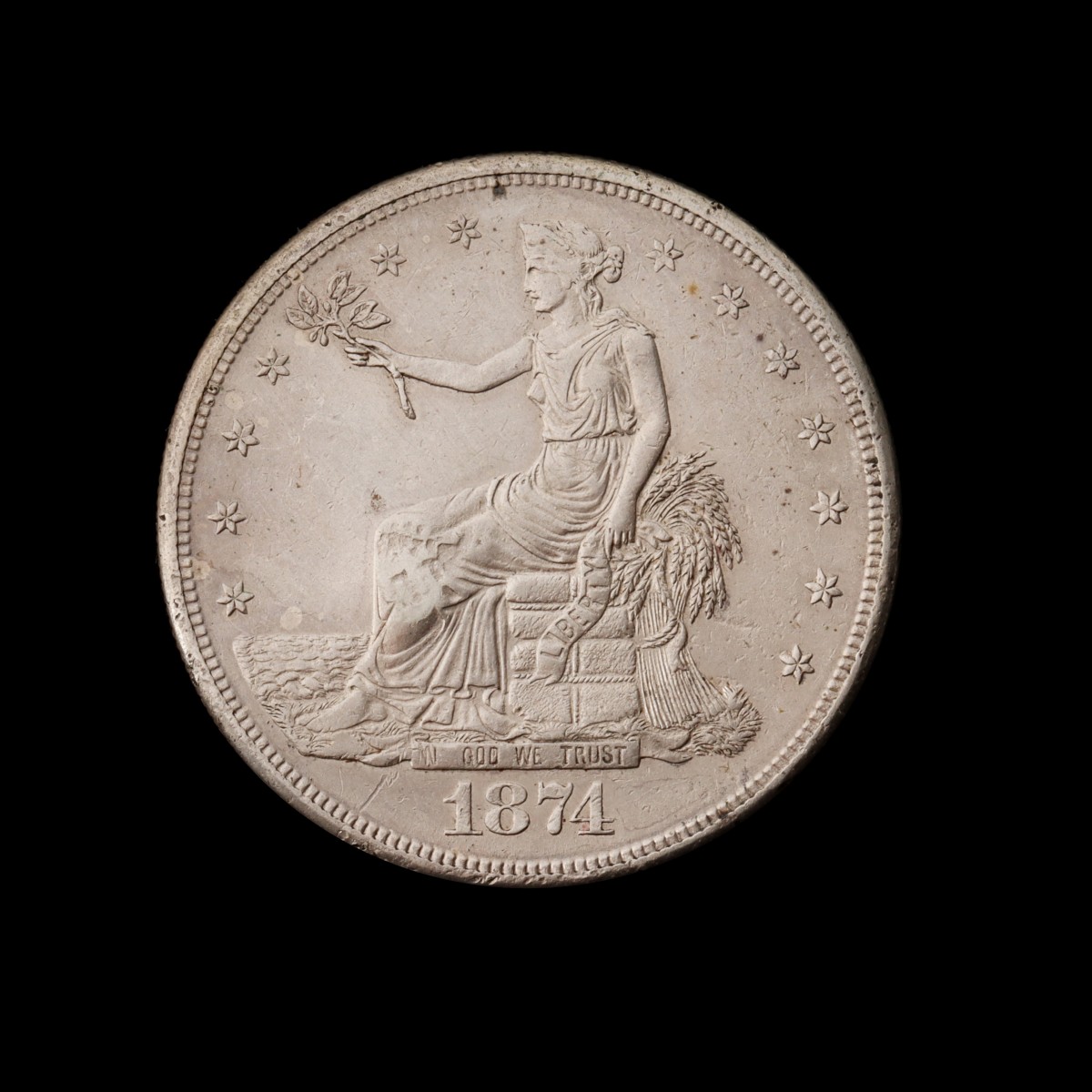 AN 1874-S U.S. TRADE DOLLAR WITH CHOP MARK