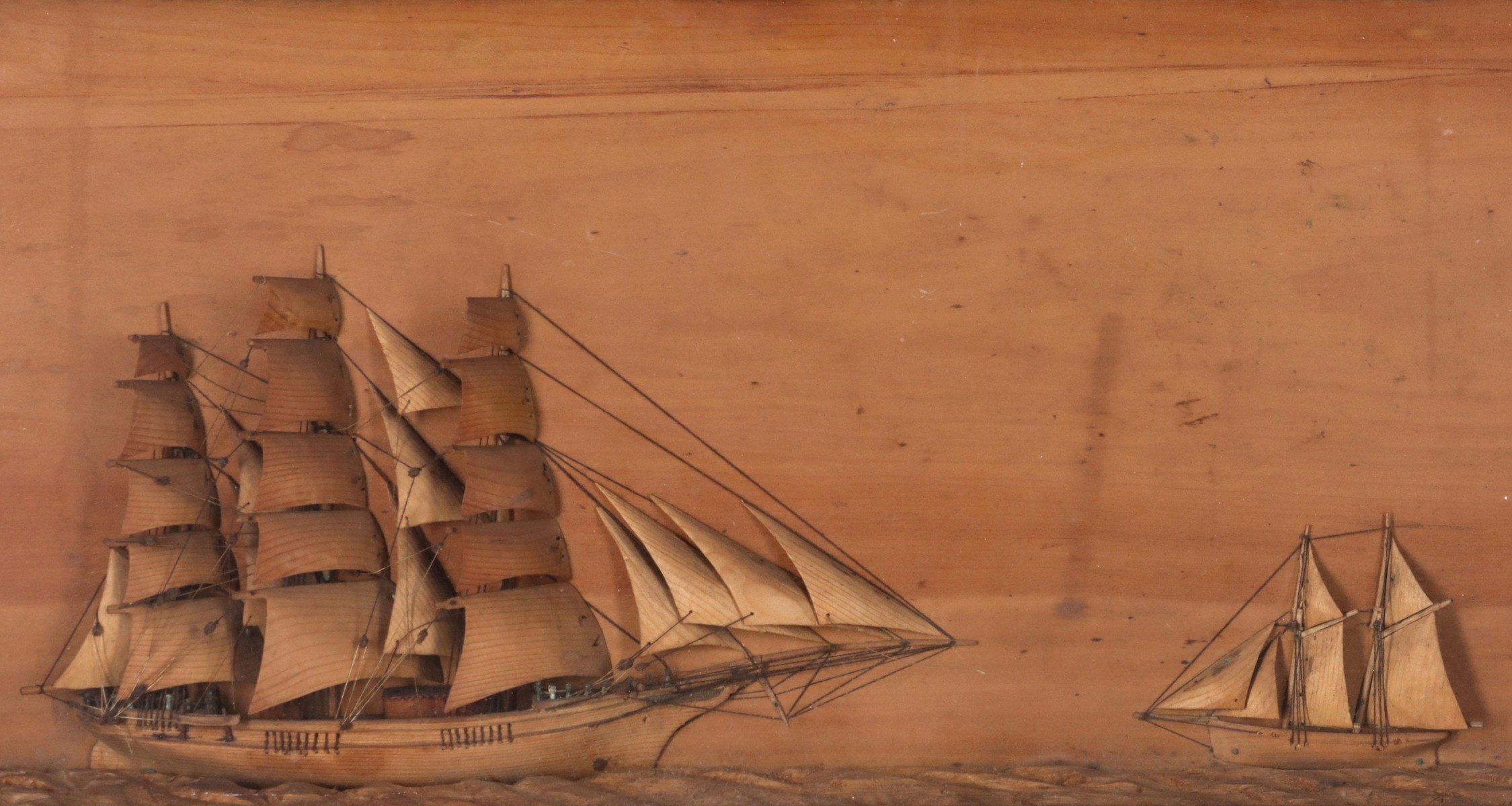 AN UNUSUAL CARVED WOOD FOLK ART DIORAMA WITH SHIPS