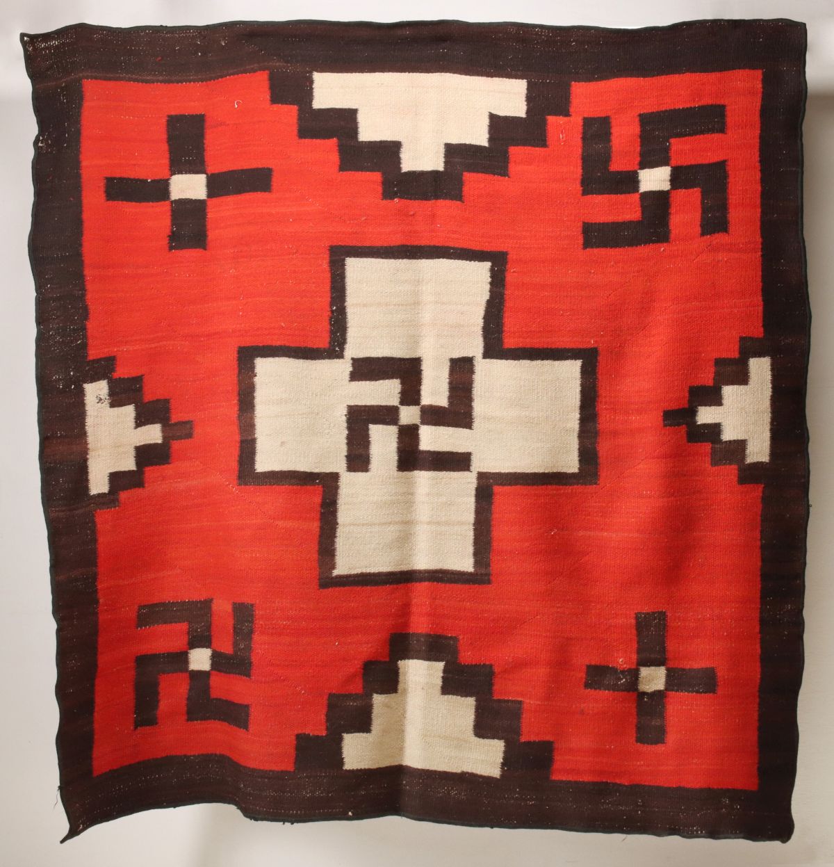 A 75 x 70 NAVAJO WEAVING WITH CENTRAL CROSS C. 1930
