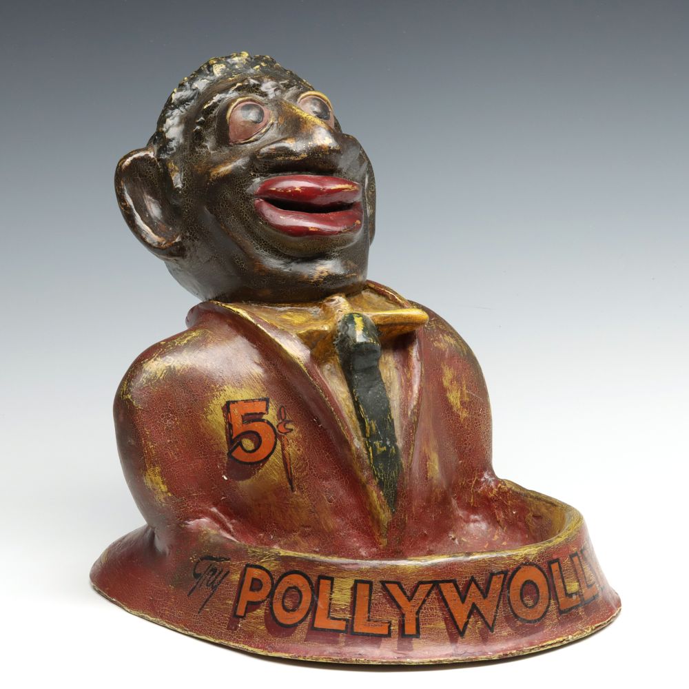 A 1940s HARD RUBBER FIGURAL GUM ADVERTISING DISPLAY