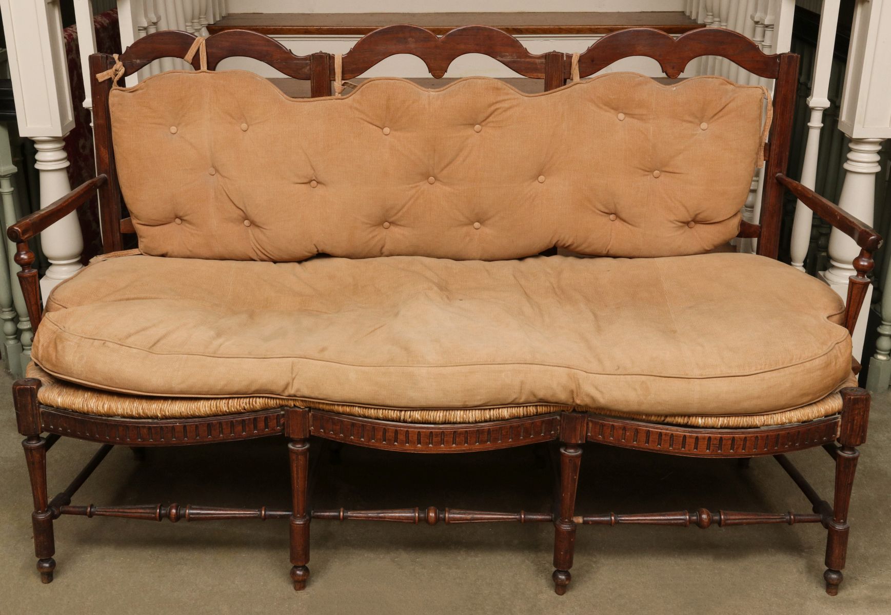 AN 18TH C. FRENCH LADDER BACK RUSH SEAT SOFA