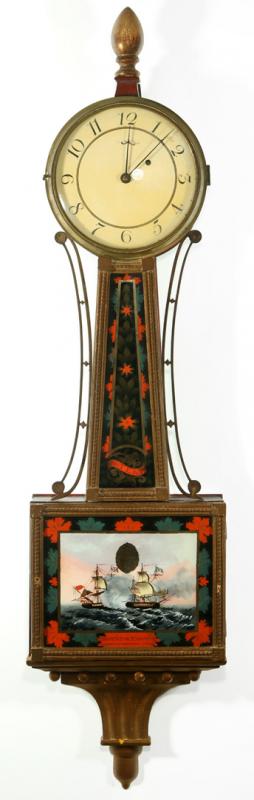 AN EARLY 19TH C. BANJO CLOCK WITH WAR OF 1812 TABLET