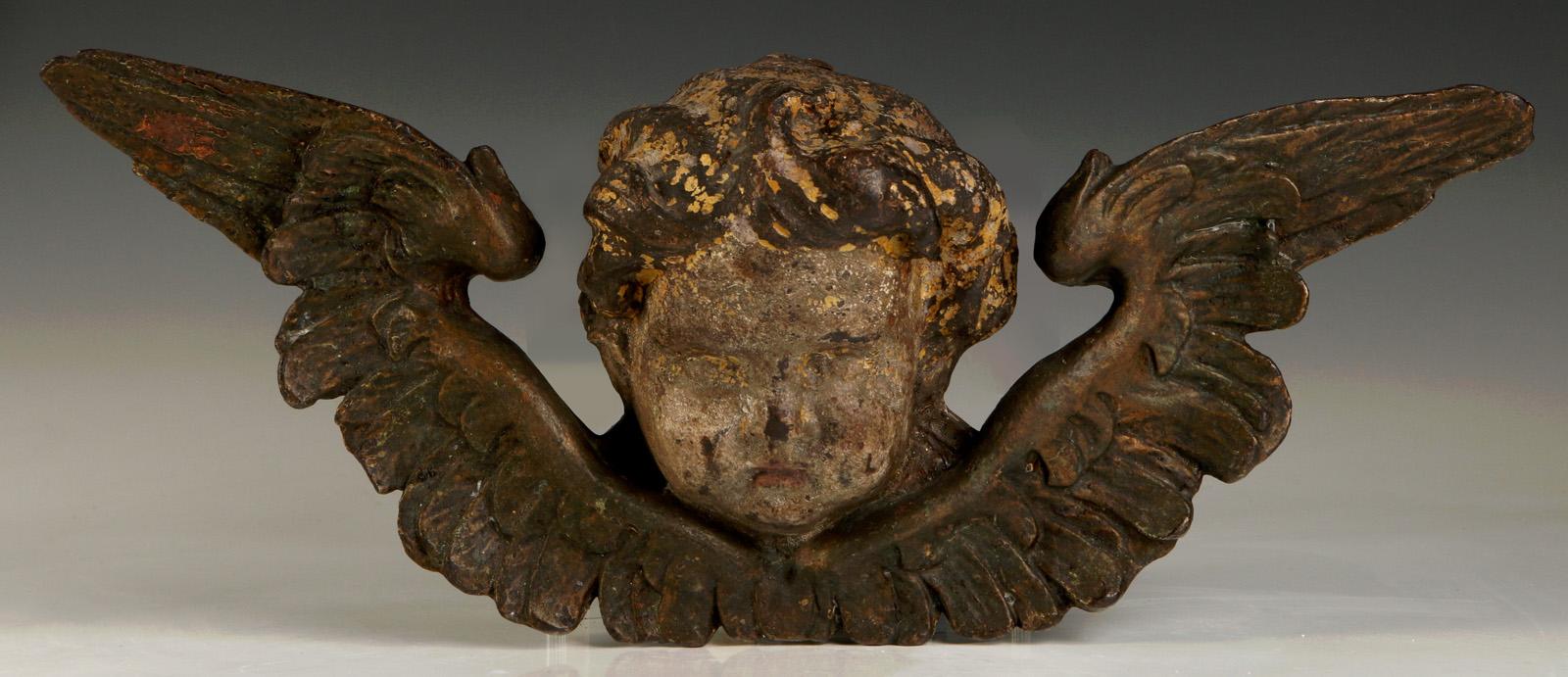 A 19TH C. PAINTED CAST IRON ARCHITECTURAL CHERUB'S FACE 