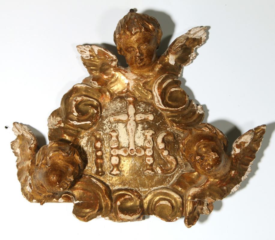 AN 18TH C. GILDED PLAQUE WITH THREE CHERUBS