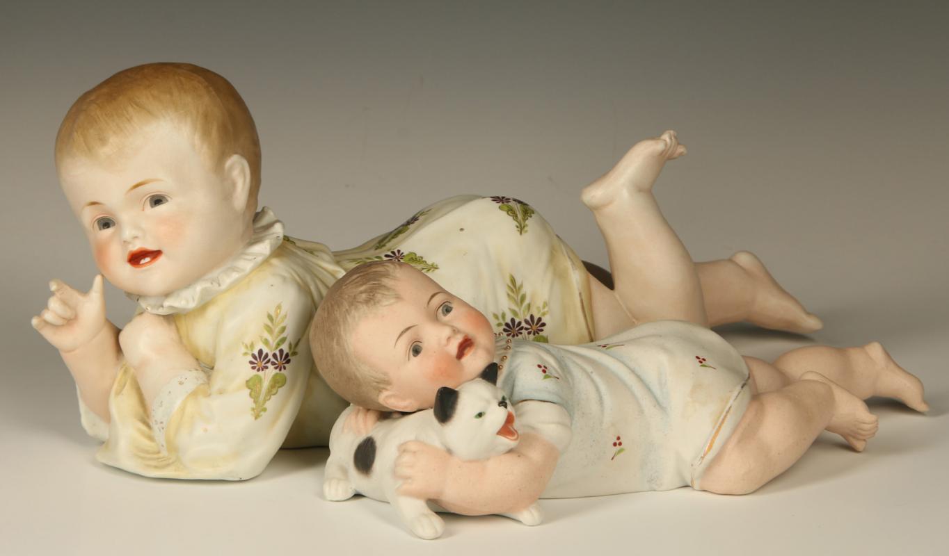 TWO LATE 19TH C. BISQUE PORCELAIN PIANO BABIES