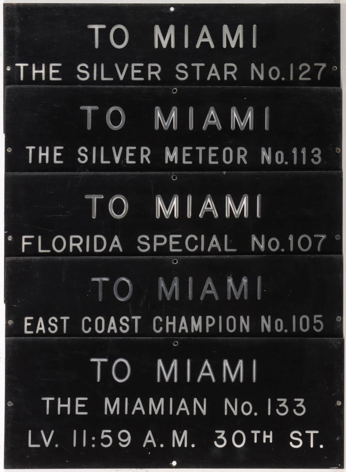FIVE ENGRAVED LETTER ACRYLIC TRAIN STATION SIGNS